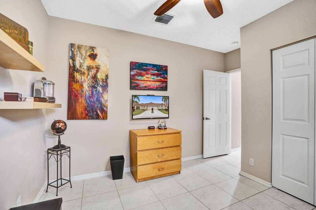 6251 Long Key Lane Boynton Beach, FL 33472 - Photo 19 of 41 a room with storage and utility