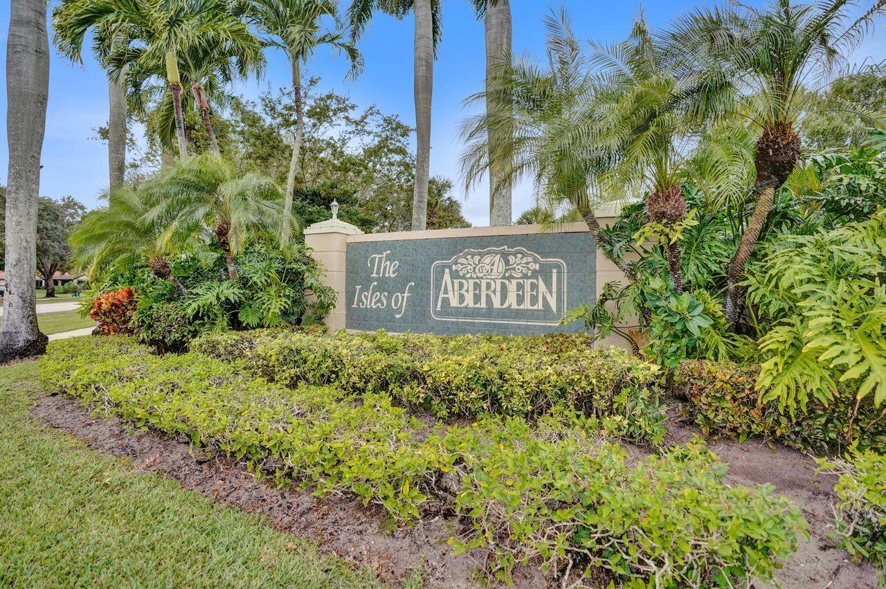 6251 Long Key Lane Boynton Beach, FL 33472 - Photo 28 of 41 a sign of golf club on a wall