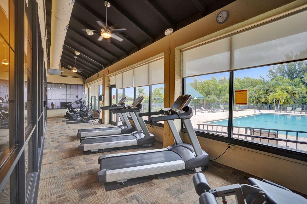 6251 Long Key Lane Boynton Beach, FL 33472 - Photo 34 of 41 a view of staircase with a rug