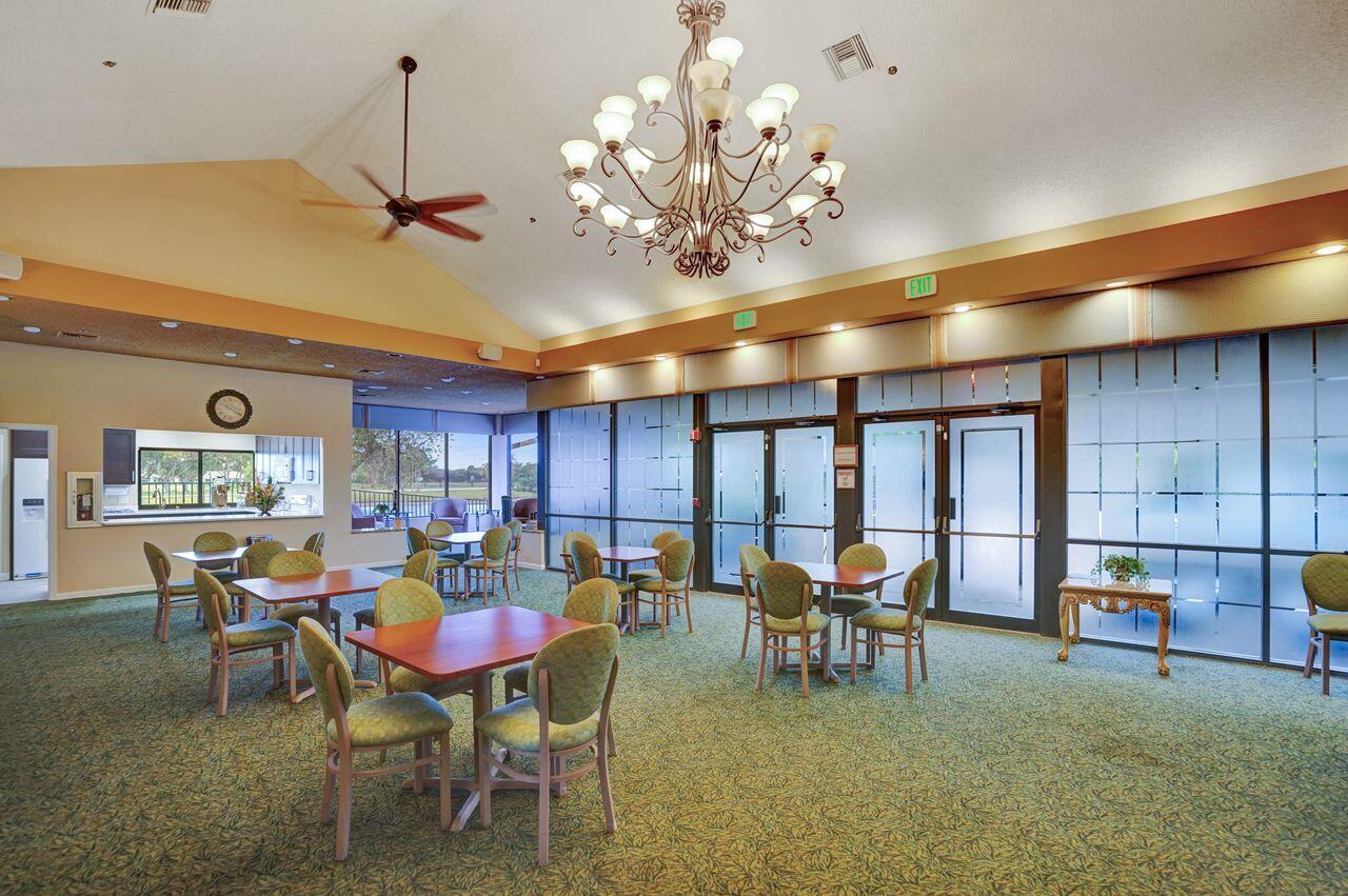 6251 Long Key Lane Boynton Beach, FL 33472 - Photo 35 of 41 a view of a dining room with furniture window and outside view