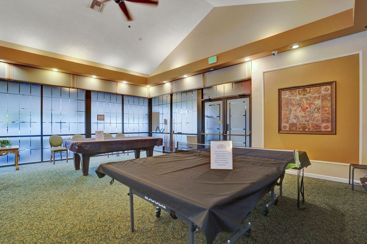 6251 Long Key Lane Boynton Beach, FL 33472 - Photo 38 of 41 a view of a dining room with furniture and wooden floor
