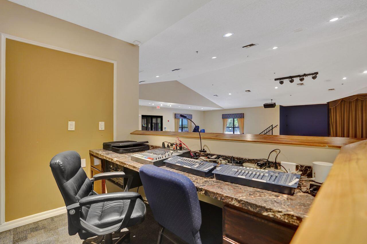 6251 Long Key Lane Boynton Beach, FL 33472 - Photo 40 of 41 a living room with furniture and a table