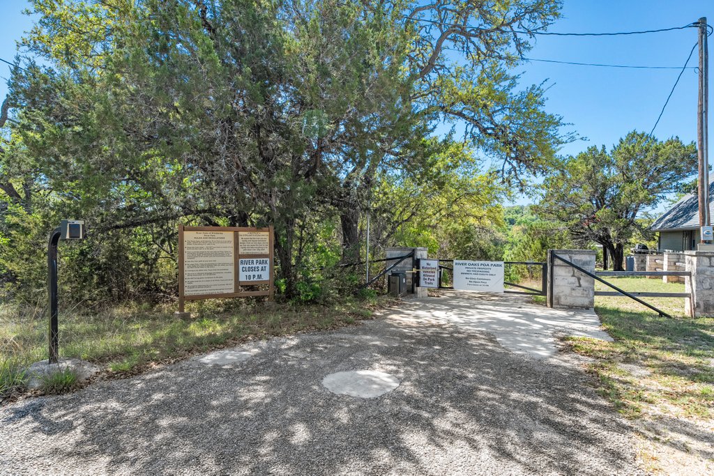 716 Ridge Oak Drive Wimberley, TX 78676 - Photo 14 of 16 a view of backyard with trees