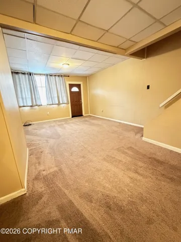 a kitchen with stainless steel appliances a refrigerator sink and cabinets