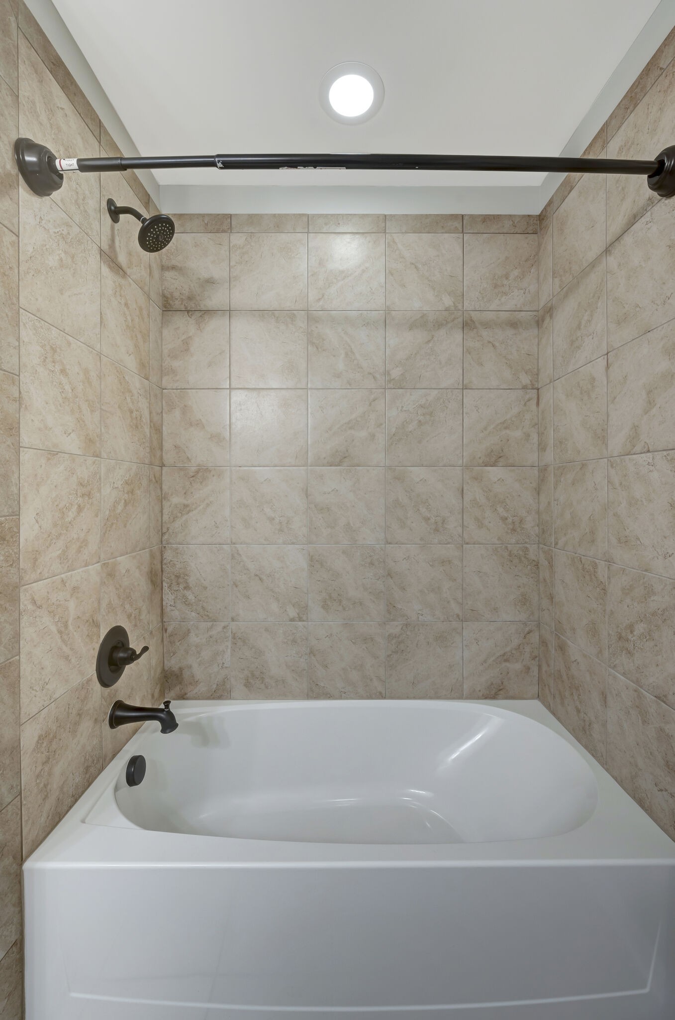 106 Shanache Drive Spring Hill, TN 37174 - Photo 21 of 31 a bathroom with a shower and a bathtub