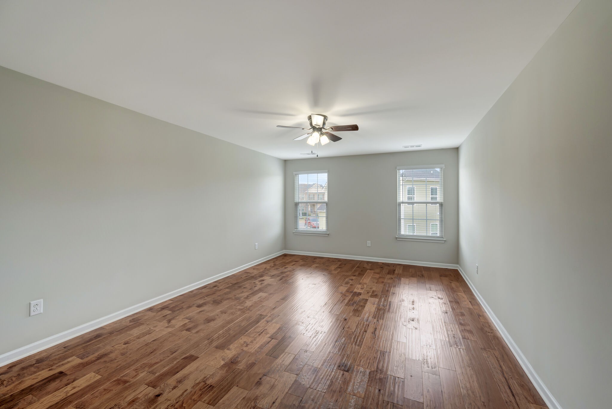 106 Shanache Drive Spring Hill, TN 37174 - Photo 22 of 31 a view of an empty room with wooden floor and window