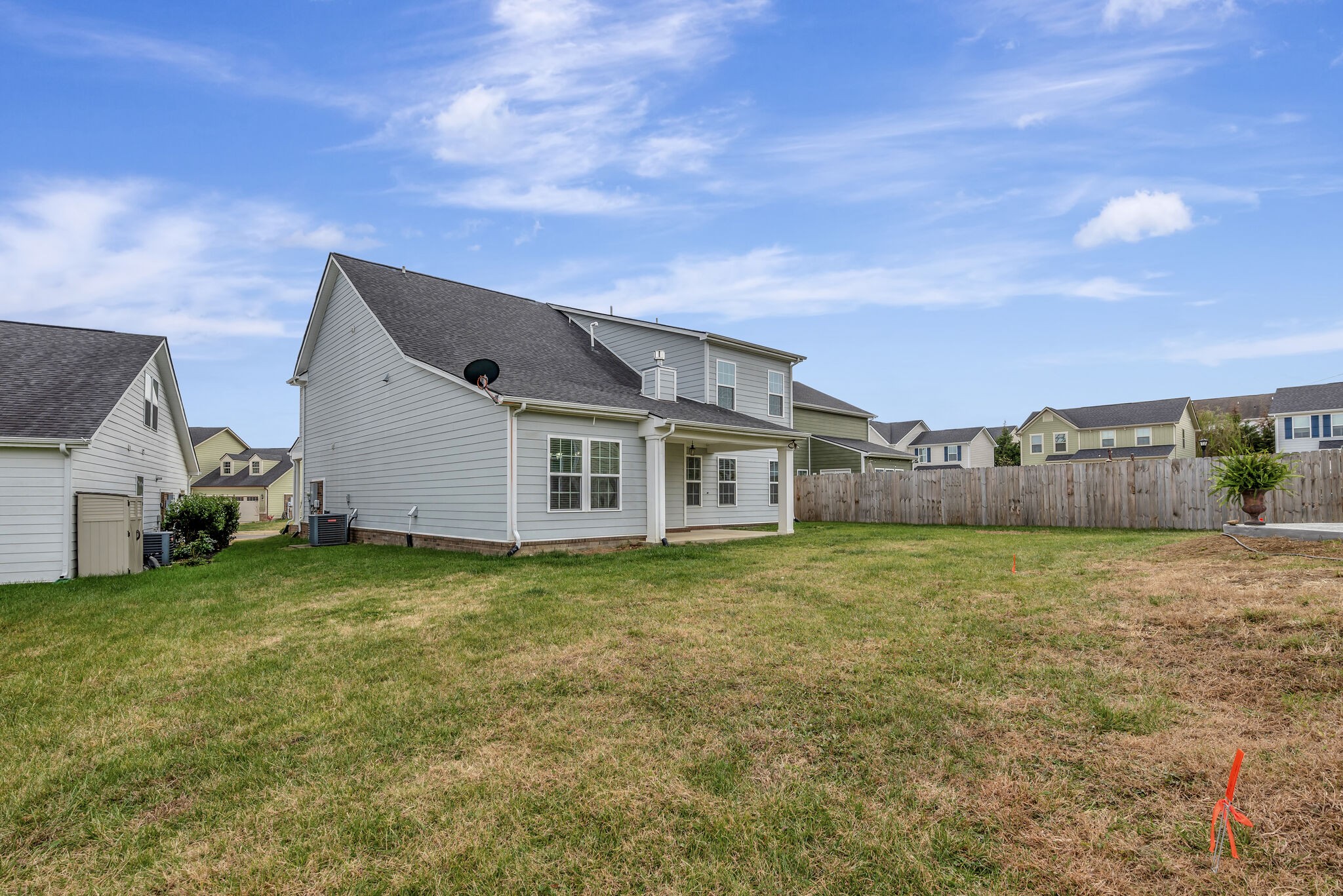 106 Shanache Drive Spring Hill, TN 37174 - Photo 30 of 31 a house with huge green field in front of it
