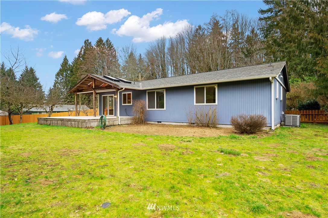 1900 Higgins Road Southeast Port Orchard, WA 98366 - Photo 18 of 26 a front view of a house with garden
