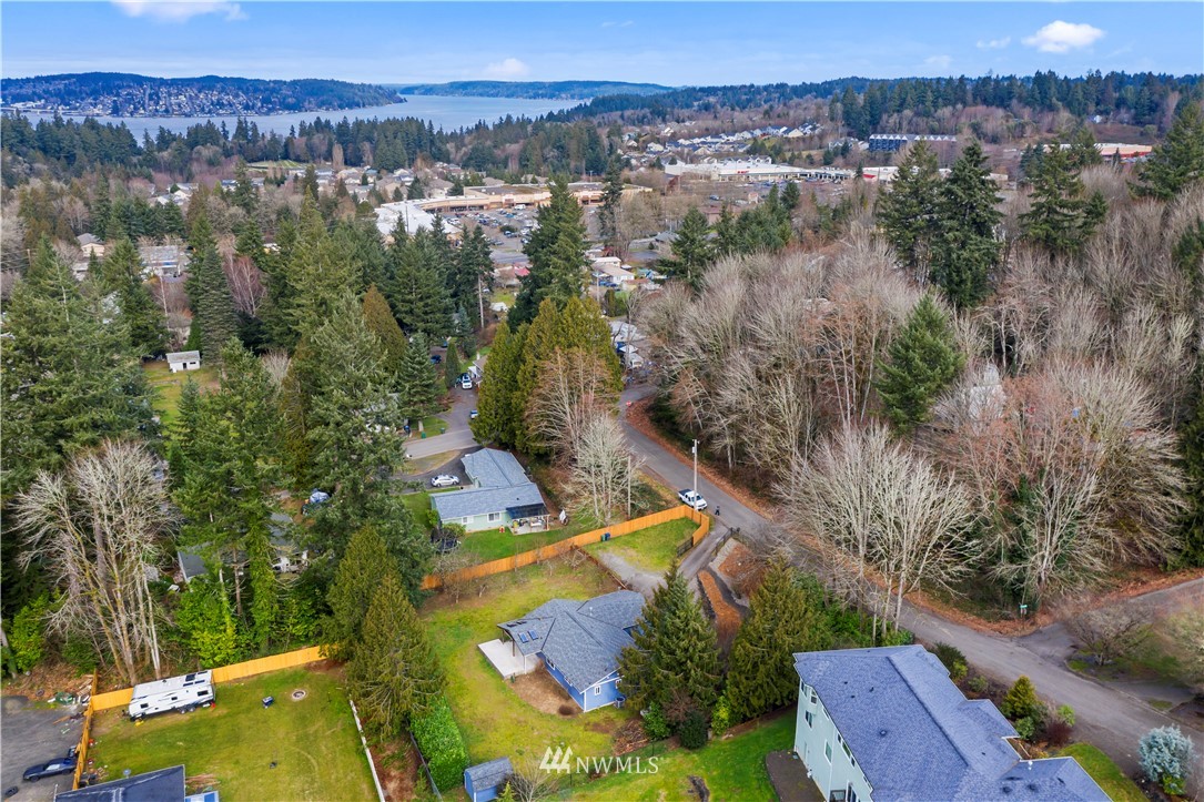 1900 Higgins Road Southeast Port Orchard, WA 98366 - Photo 23 of 26 an aerial view of a house with a lake view