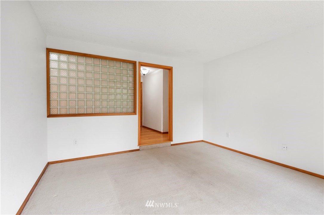 1900 Higgins Road Southeast Port Orchard, WA 98366 - Photo 9 of 26 an empty room with a window