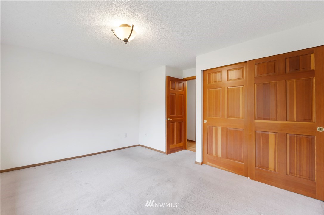 1900 Higgins Road Southeast Port Orchard, WA 98366 - Photo 10 of 26 a view of an empty room