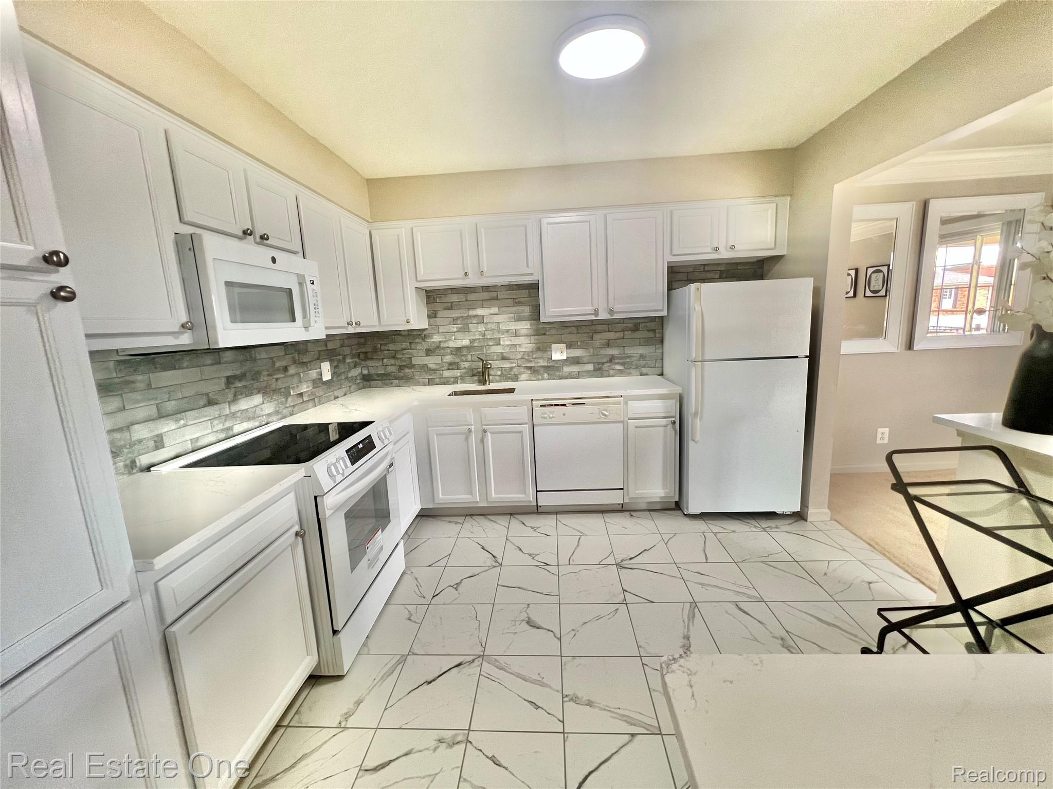 6121 Orchard Lake Road, Unit 202 West Bloomfield, MI 48322 - Photo 7 of 18 6121 Orchard 202 6.jpeg