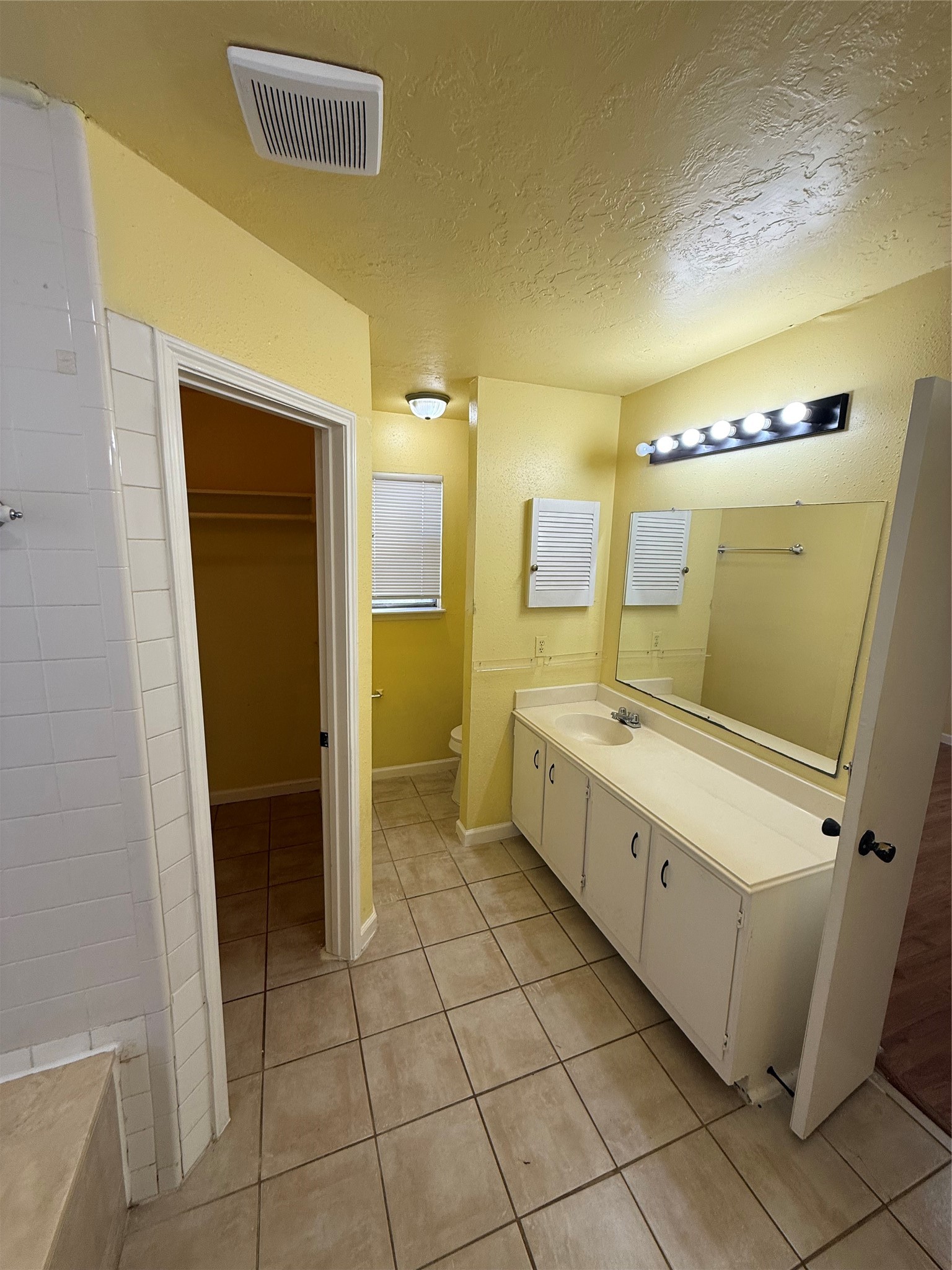 3918 Algernon Drive Spring, TX 77373 - Photo 11 of 17 a bathroom with a granite countertop sink mirror and toilet