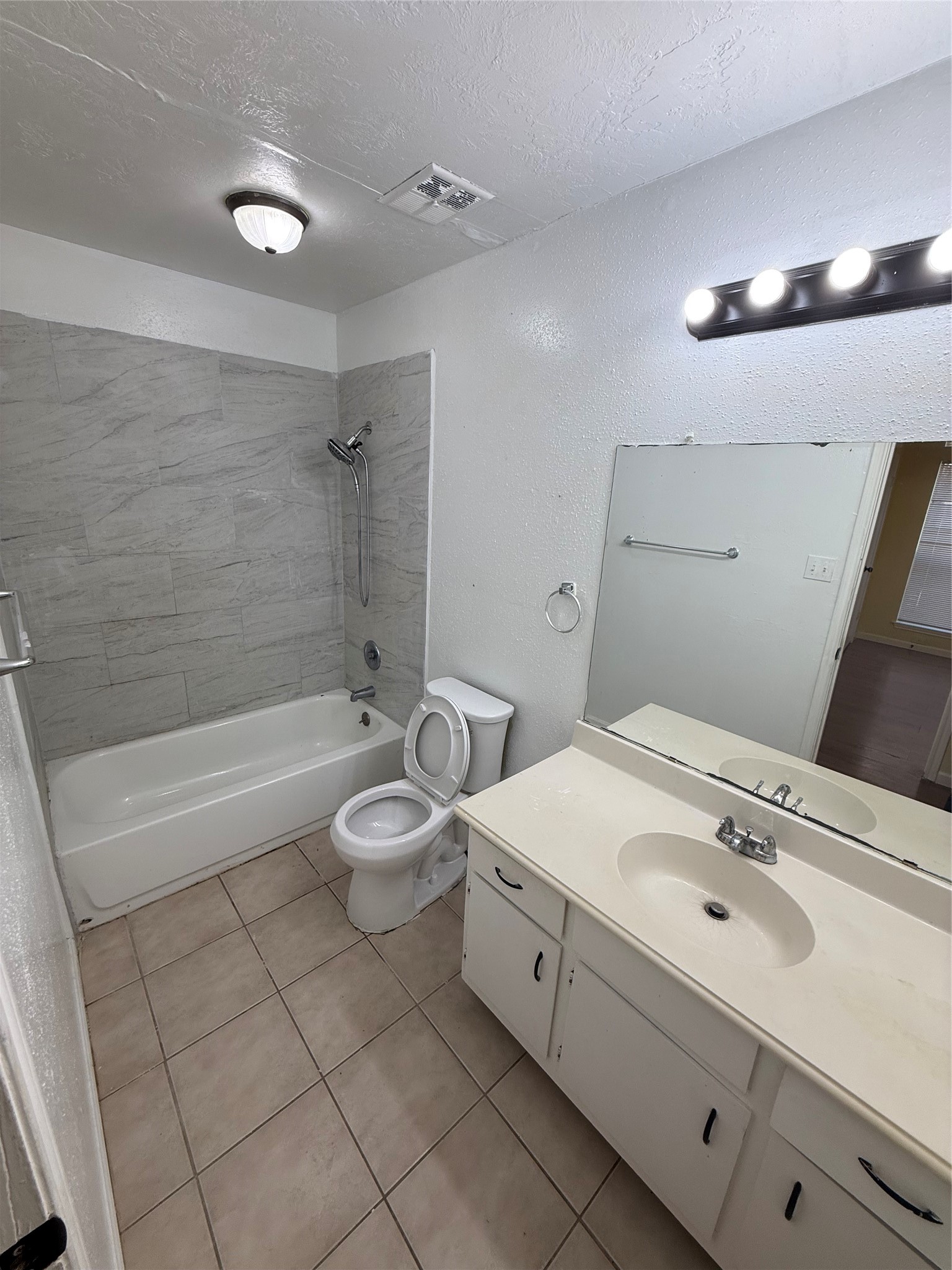 3918 Algernon Drive Spring, TX 77373 - Photo 13 of 17 a bathroom with a double vanity sink toilet and shower