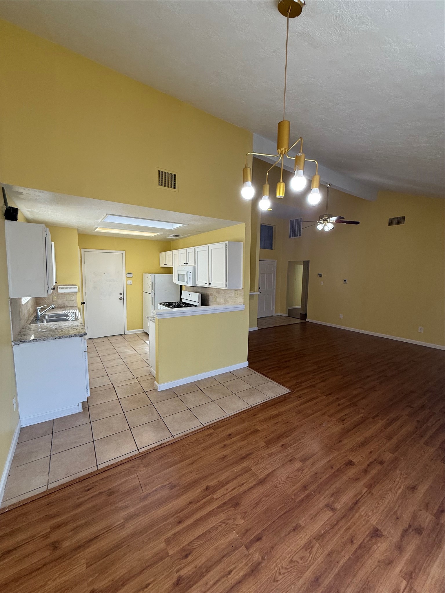3918 Algernon Drive Spring, TX 77373 - Photo 5 of 17 a view of a kitchen with a sink and a stove top oven