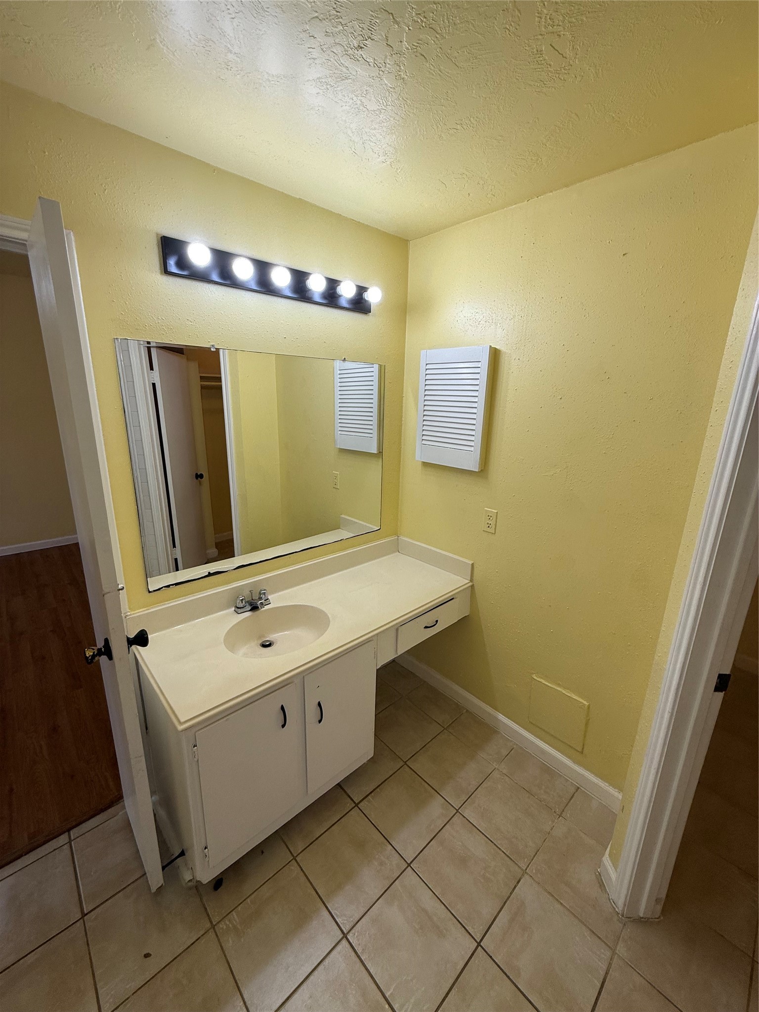 3918 Algernon Drive Spring, TX 77373 - Photo 10 of 17 a bathroom with a sink and a mirror