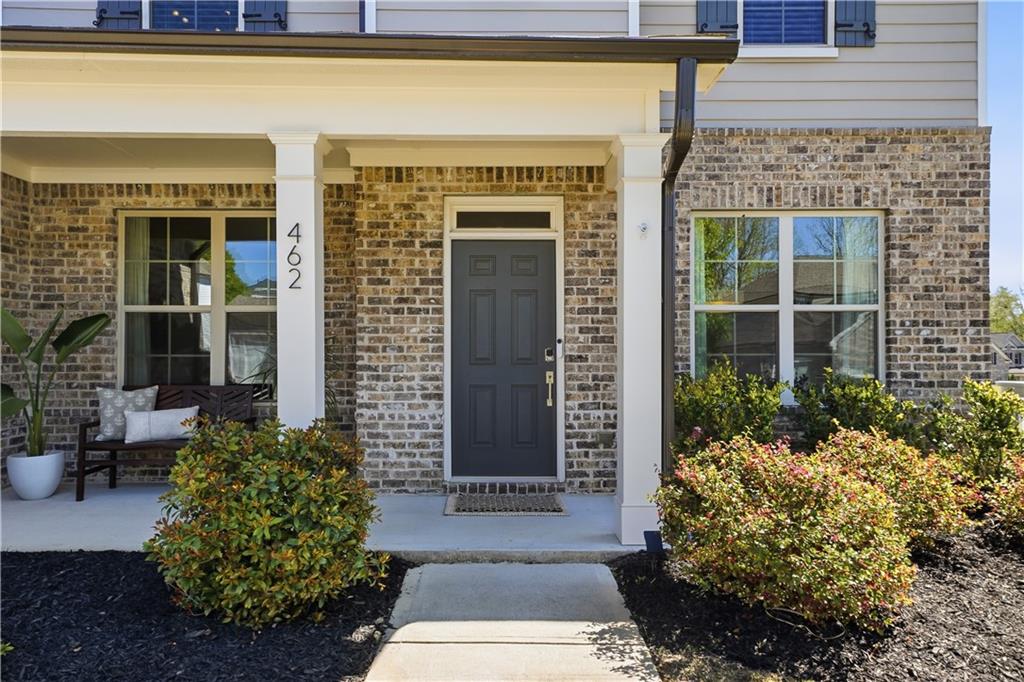 462 Carmichael Circle Canton, GA 30115 - Photo 4 of 70 a front view of a house having yard
