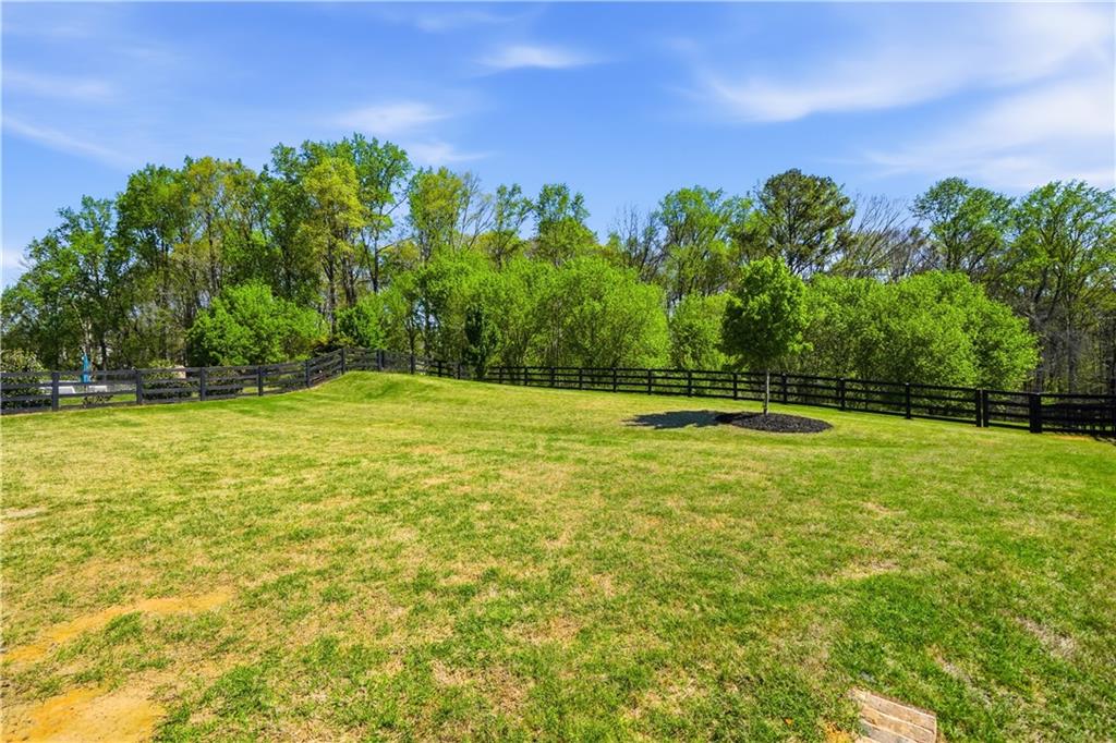 462 Carmichael Circle Canton, GA 30115 - Photo 50 of 70 a view of swimming pool with an outdoor space and seating area