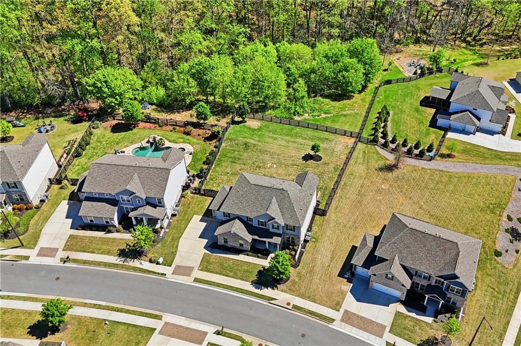 462 Carmichael Circle Canton, GA 30115 - Photo 55 of 70 an aerial view of a house with a garden and pool