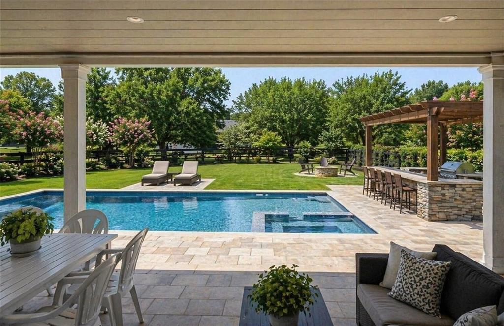 462 Carmichael Circle Canton, GA 30115 - Photo 57 of 70 a view of a swimming pool with a patio and a yard