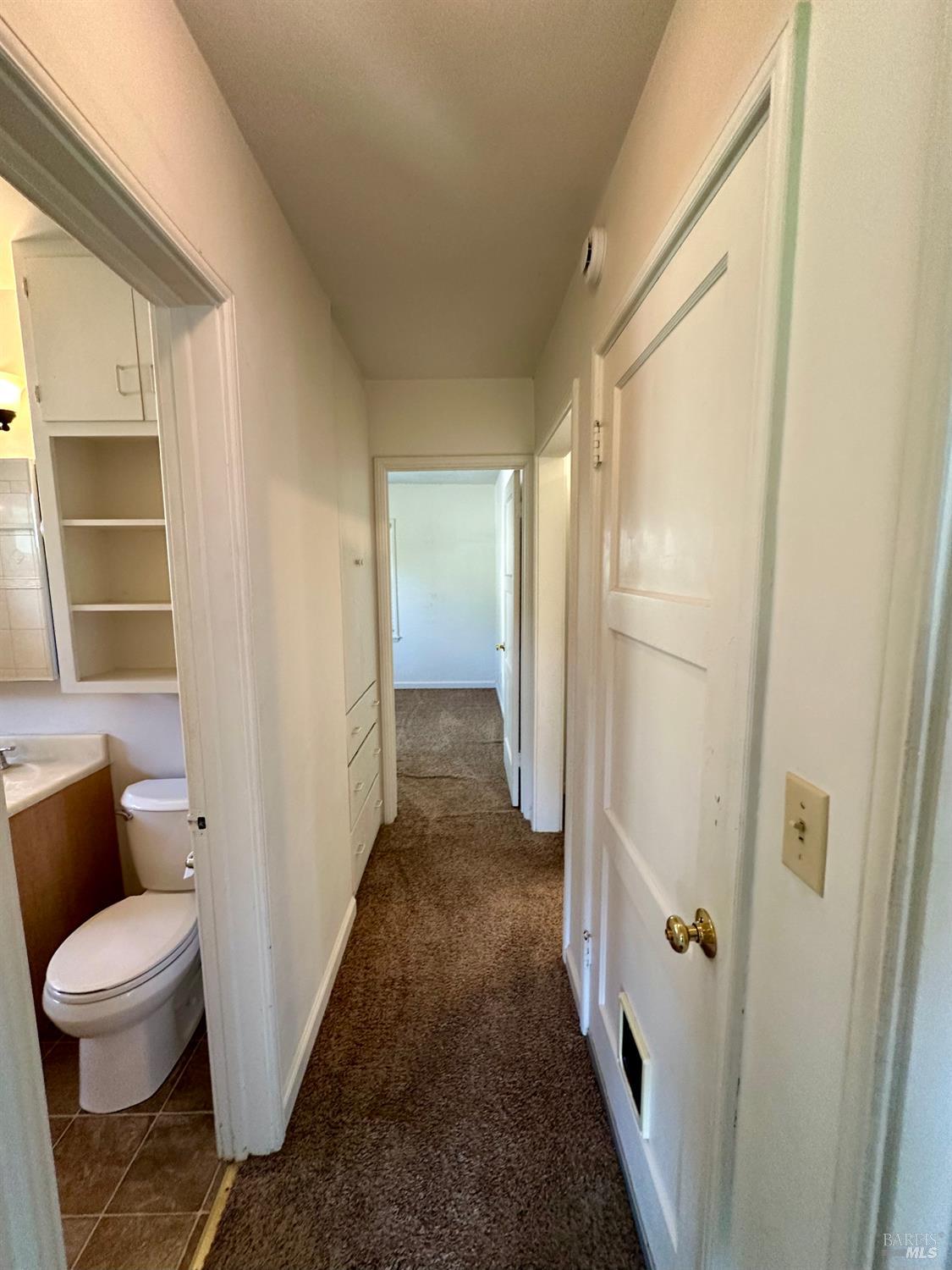 908 Sanitarium Road Deer Park, CA 94576 - Photo 8 of 14 a bathroom with a sink and toilet