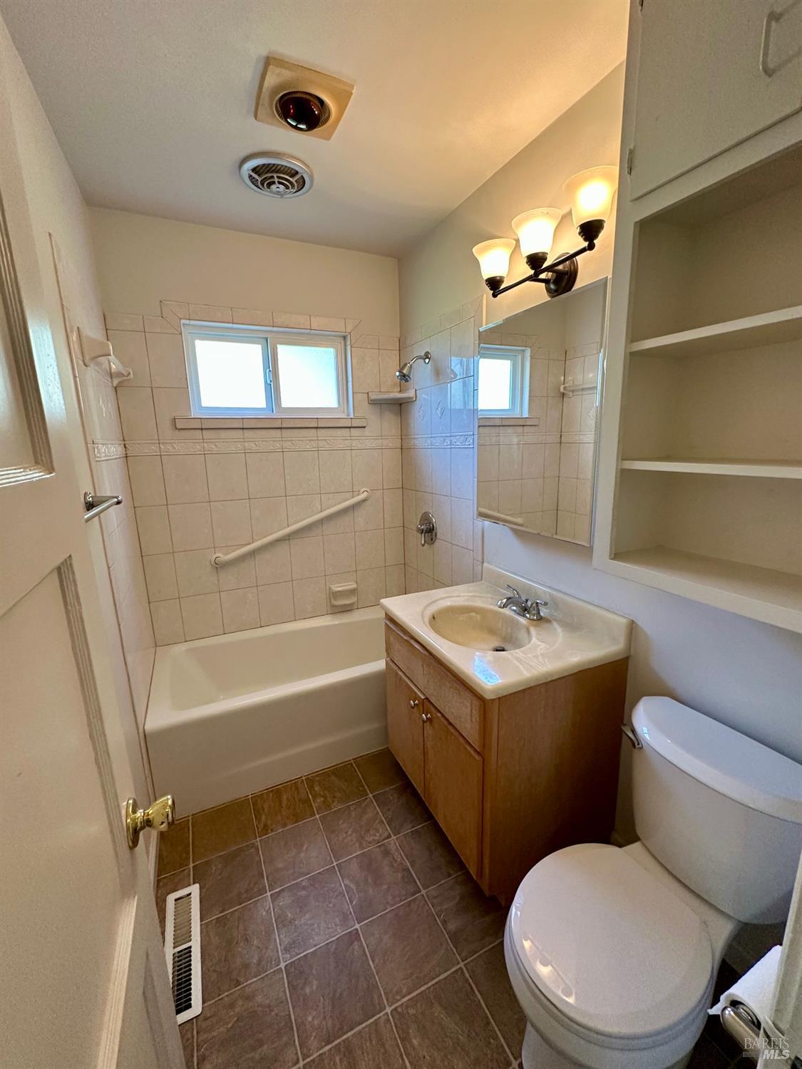 908 Sanitarium Road Deer Park, CA 94576 - Photo 9 of 14 a bathroom with a sink a toilet and bathtub