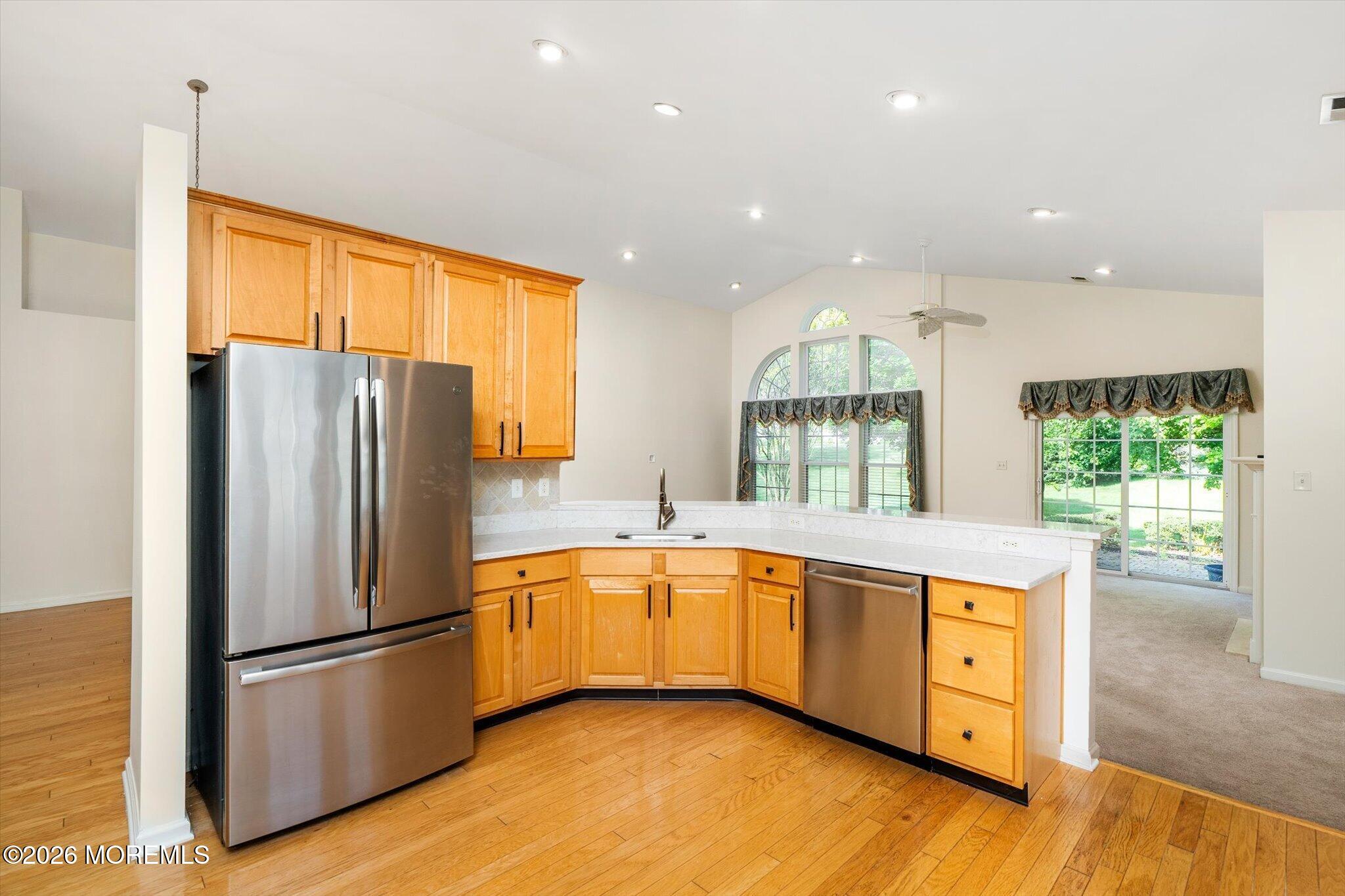 10 Powderhorn Way Allentown, NJ 08501 - Photo 12 of 27 a kitchen with stainless steel appliances granite countertop a refrigerator a sink and a stove