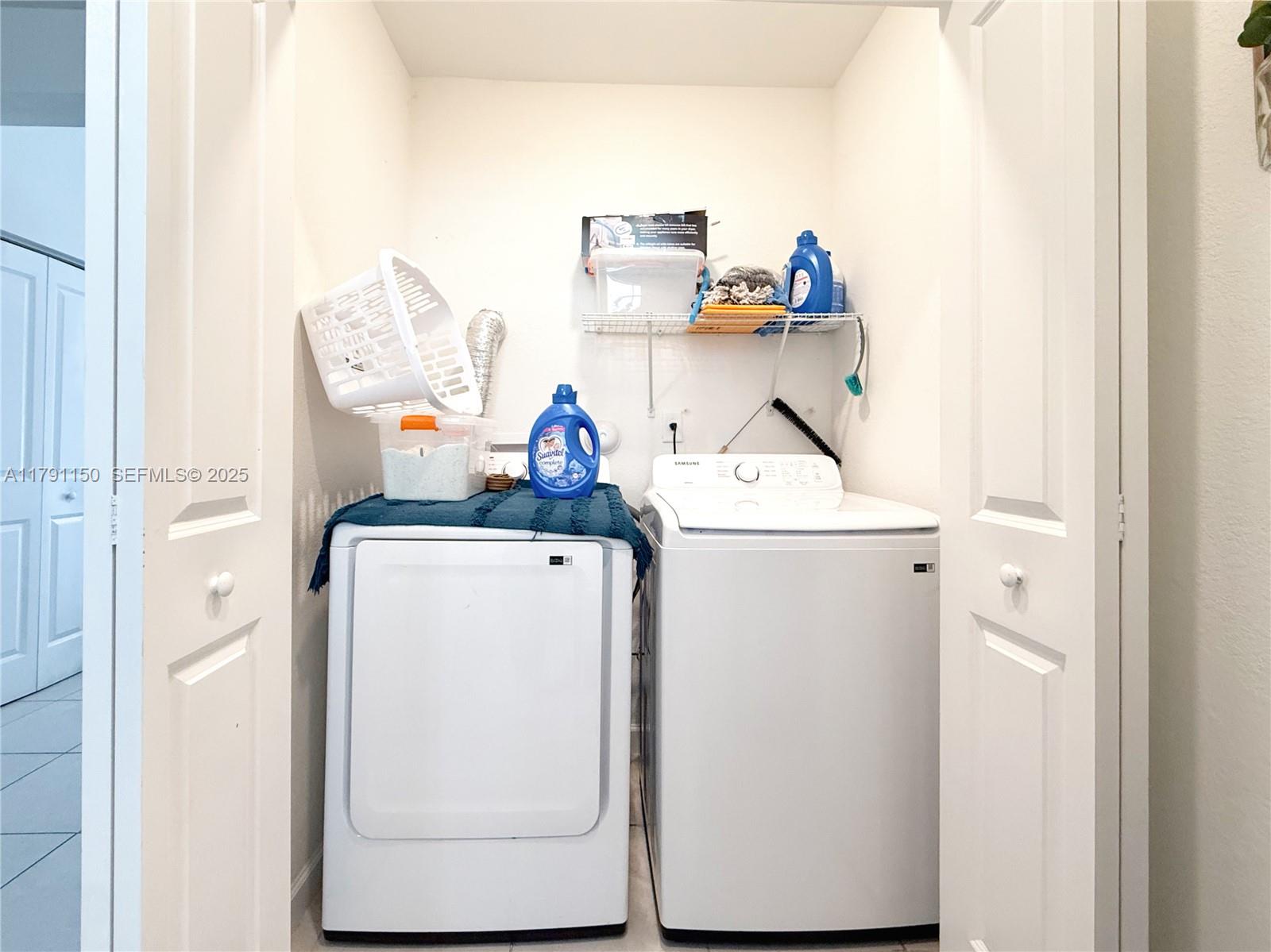11871 Southwest 247th Terrace Homestead, FL 33032 - Photo 23 of 23 a utility room with dryer and washer