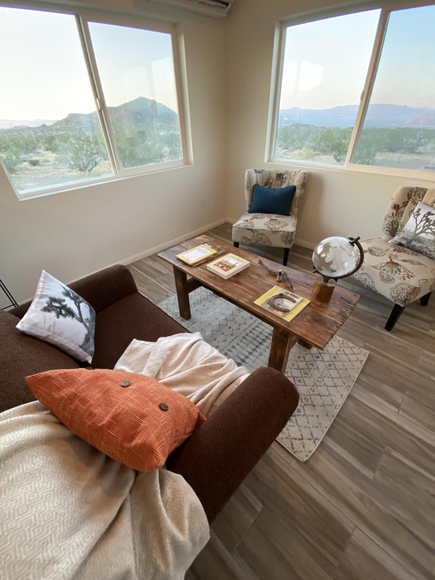 54836 Alderman Road Landers, CA 92285 - Photo 6 of 32 a living room with furniture and a window