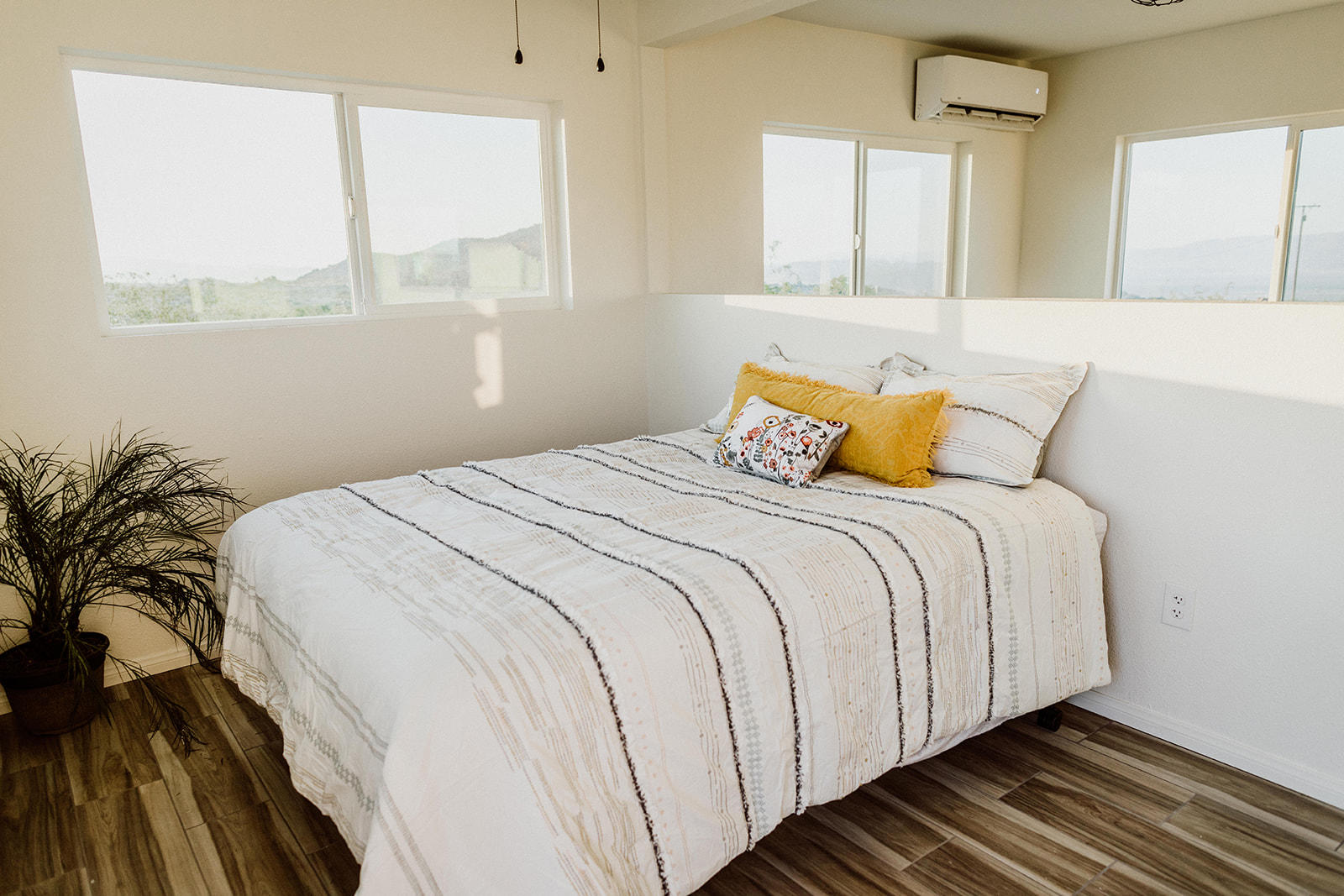 54836 Alderman Road Landers, CA 92285 - Photo 7 of 32 a bedroom with a bed and a window
