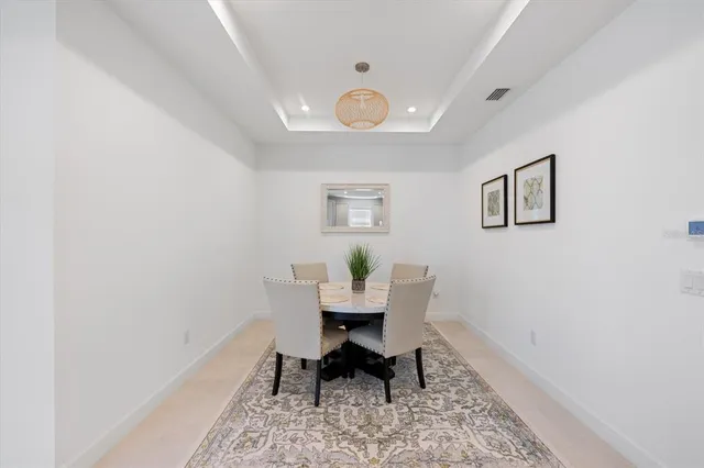 a workspace with furniture and window