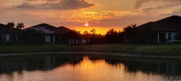 a view of a lake in front of house