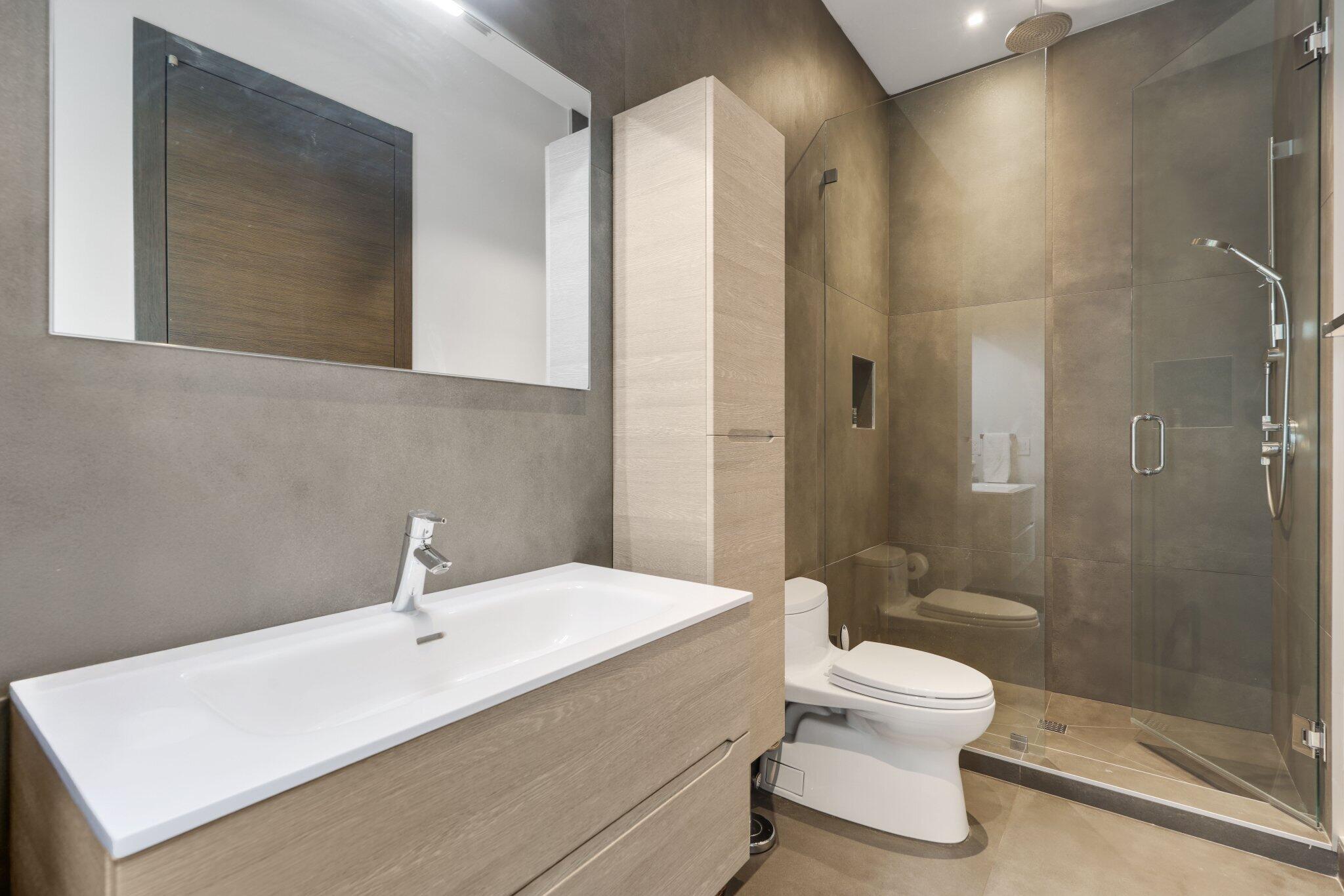 830 Northeast 71st Street Boca Raton, FL 33487 - Photo 26 of 74 bedroom 5/club roomMedia Room bath