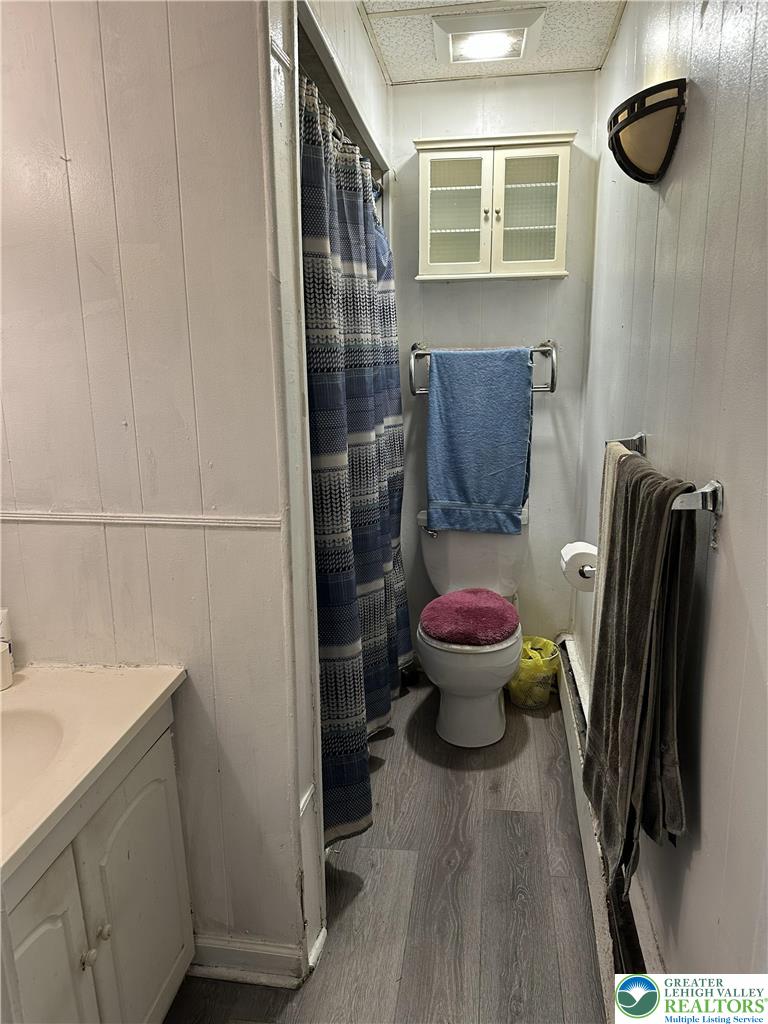 214 South Walnut Street Slatington, PA 18080 - Photo 13 of 19 a bathroom with a toilet and a sink
