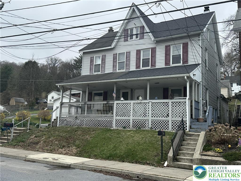 214 South Walnut Street Slatington, PA 18080 - Photo 2 of 19 a front view of a house with a garden