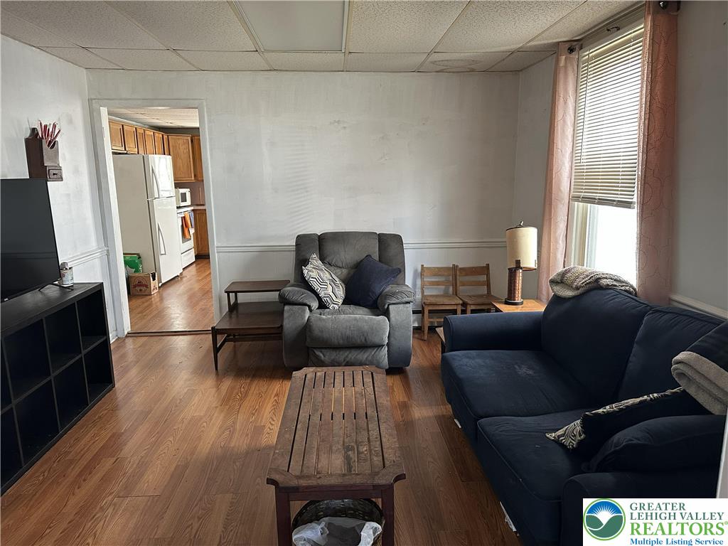 214 South Walnut Street Slatington, PA 18080 - Photo 4 of 19 a living room with furniture and a flat screen tv