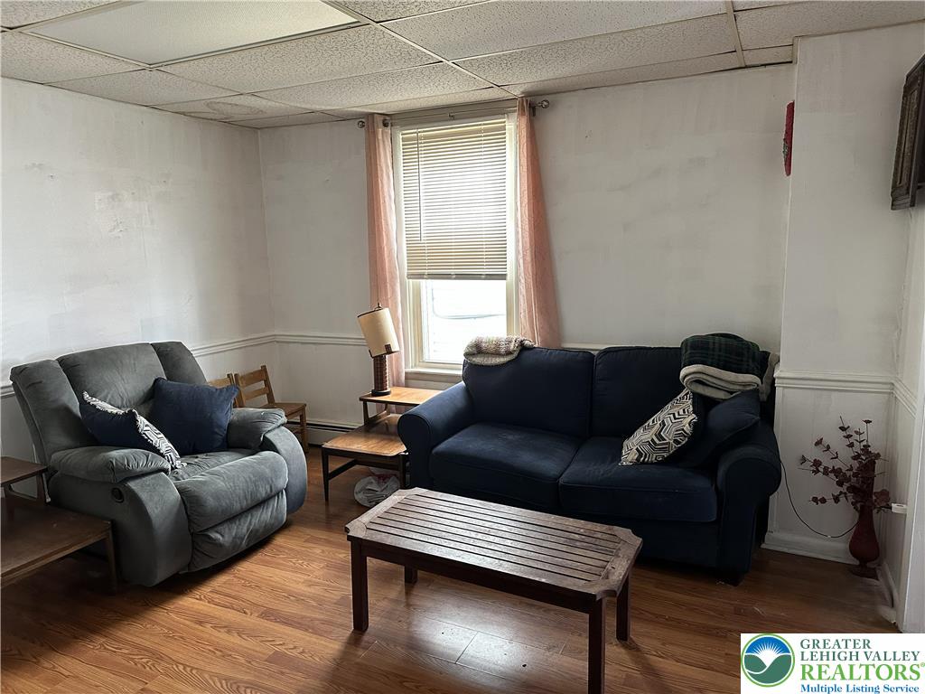 214 South Walnut Street Slatington, PA 18080 - Photo 5 of 19 a living room with furniture and a window