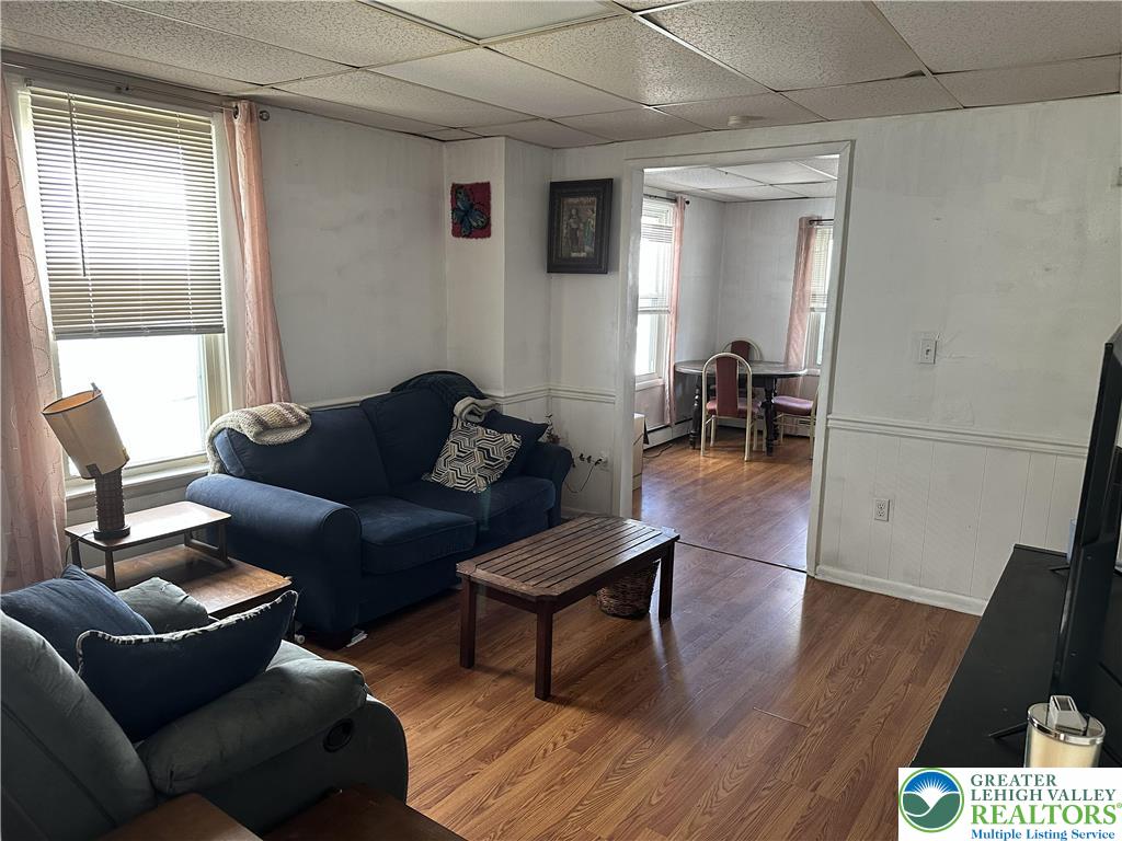 214 South Walnut Street Slatington, PA 18080 - Photo 6 of 19 a living room with furniture and a wooden floor