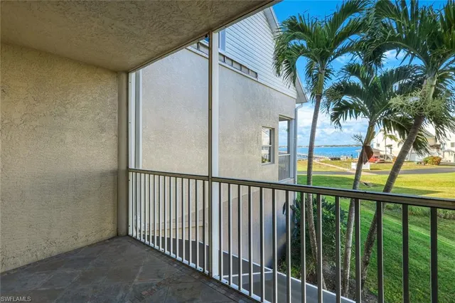 a view of swimming pool from a balcony