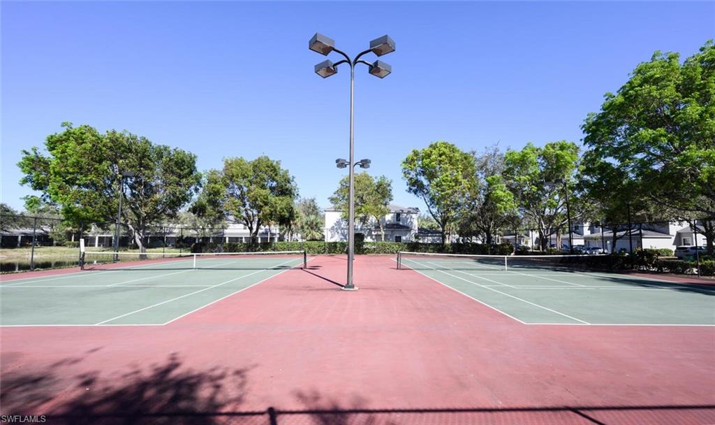 14978 Summit Pl Circle Naples, FL 34119 - Photo 33 of 35 View of tennis court with community basketball court