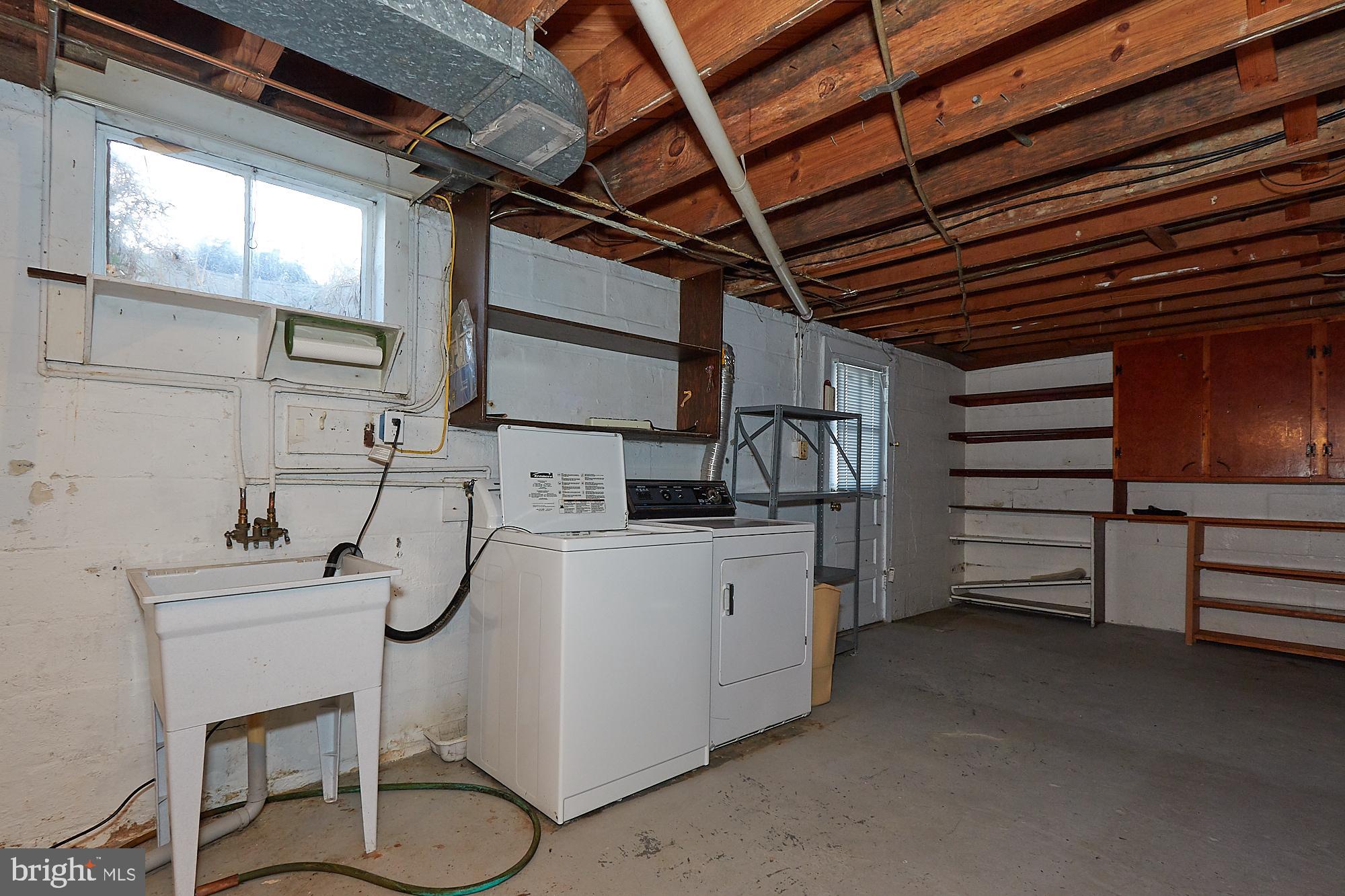 25625 Ridge Road Damascus, MD 20872 - Photo 15 of 18 Washer and dryer convey