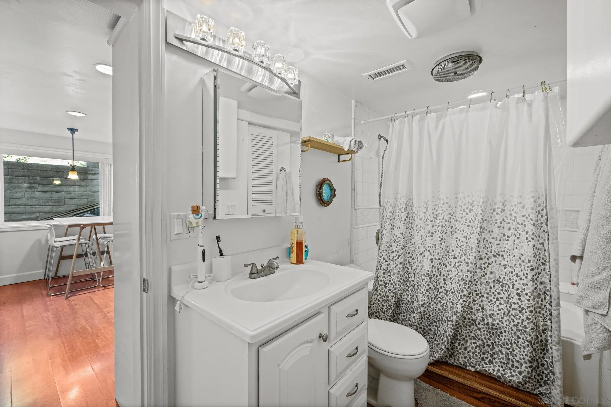 7960 Normal Avenue La Mesa, CA 91941 - Photo 33 of 42 a bathroom with a sink toilet and shower