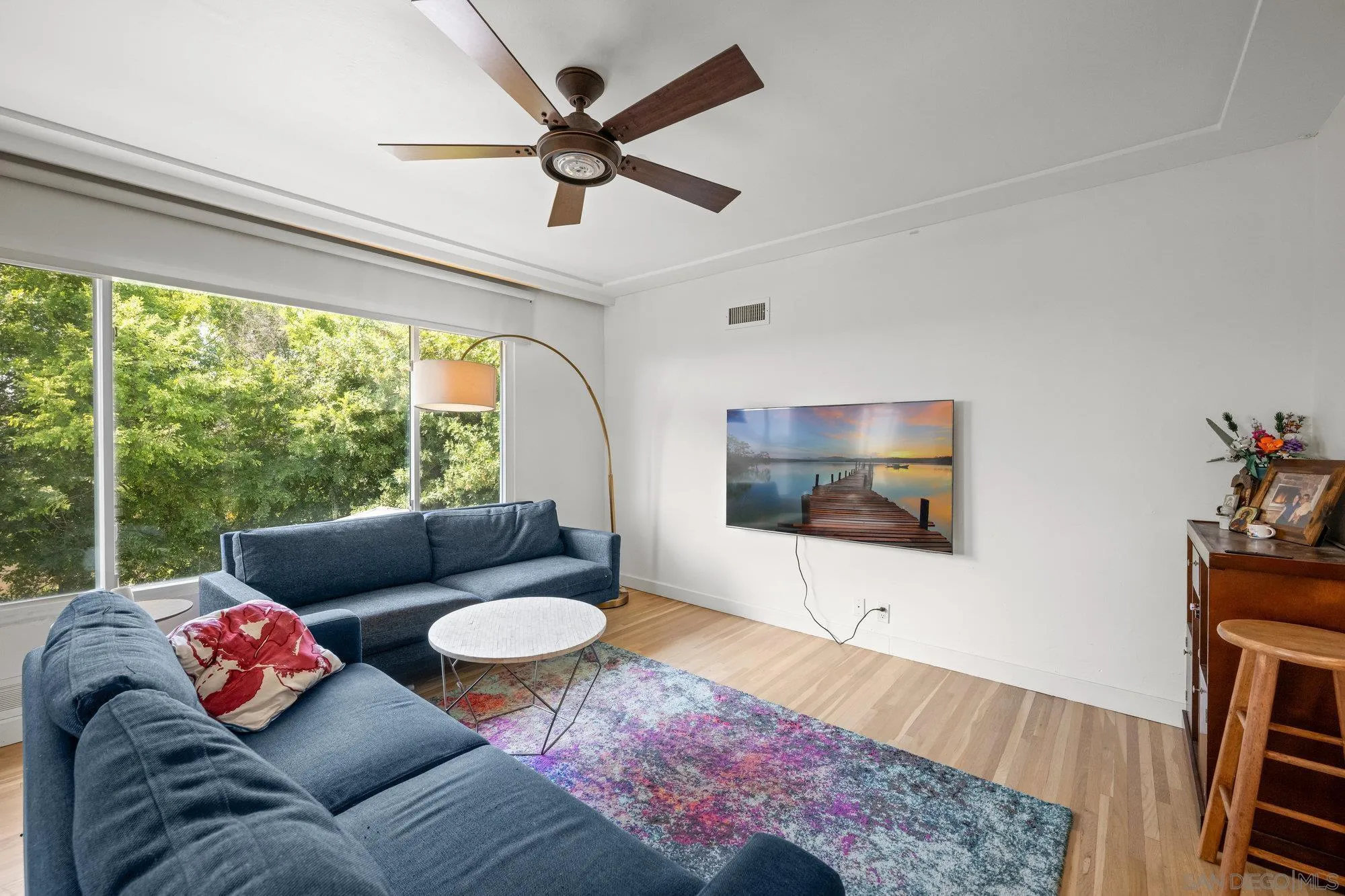 7960 Normal Avenue La Mesa, CA 91941 - Photo 4 of 42 a living room with furniture and a flat screen tv