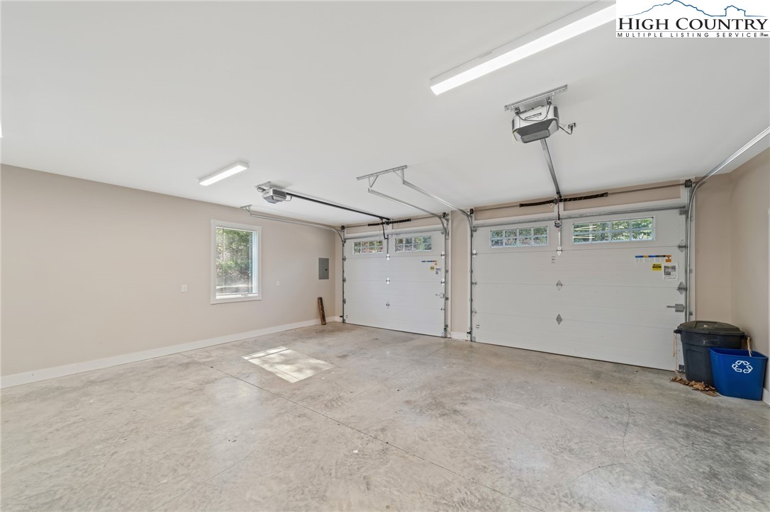 196 Eagle Nest Road Purlear, NC 28665 - Photo 32 of 36 a view of an empty room with a window