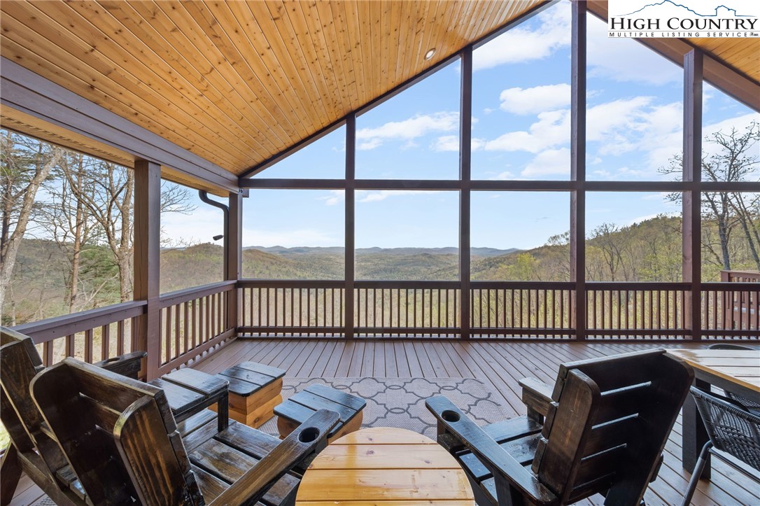 196 Eagle Nest Road Purlear, NC 28665 - Photo 4 of 36 a view of a chairs in balcony