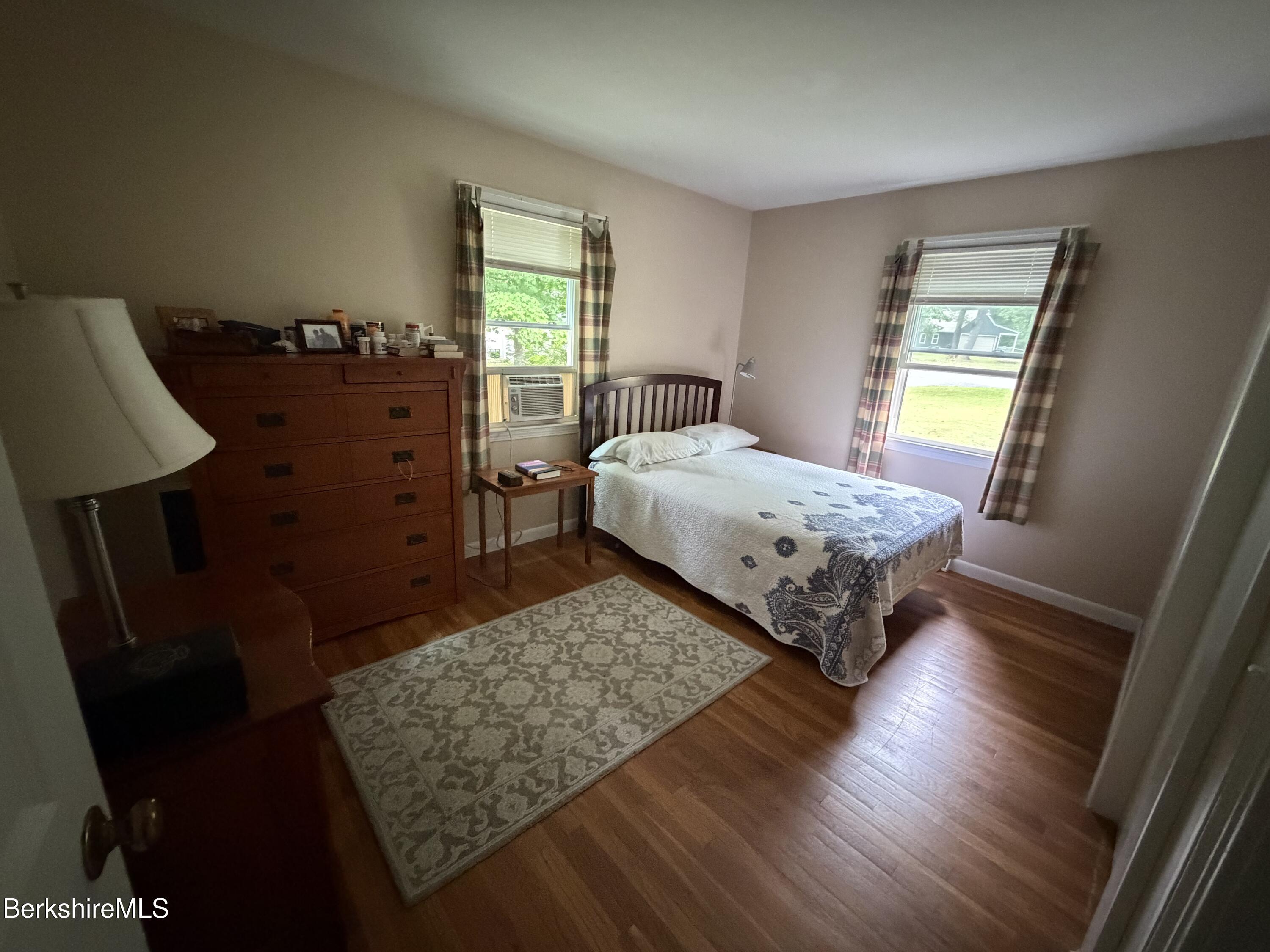 20 Sullivan Lane Lenox, MA 01240 - Photo 11 of 23 a bedroom with a bed dresser and a window