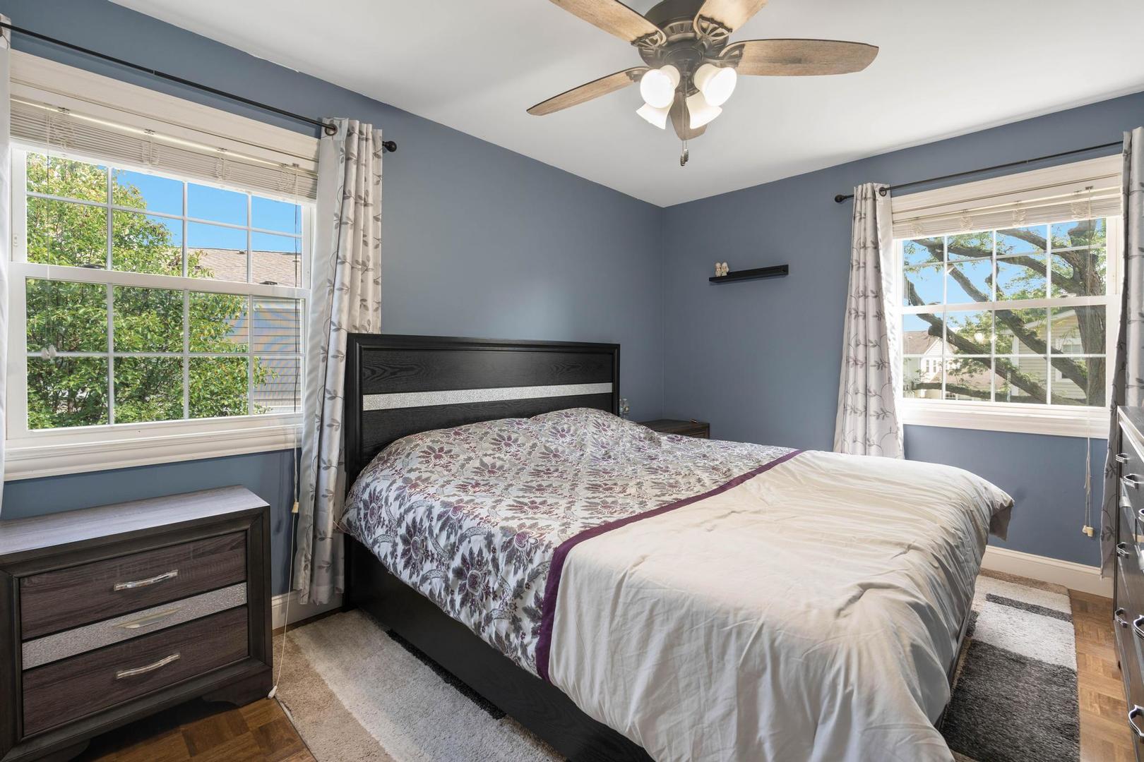 1312 Fall Court, Unit 1312 Wheeling, IL 60090 - Photo 14 of 28 a bedroom with a bed and a window