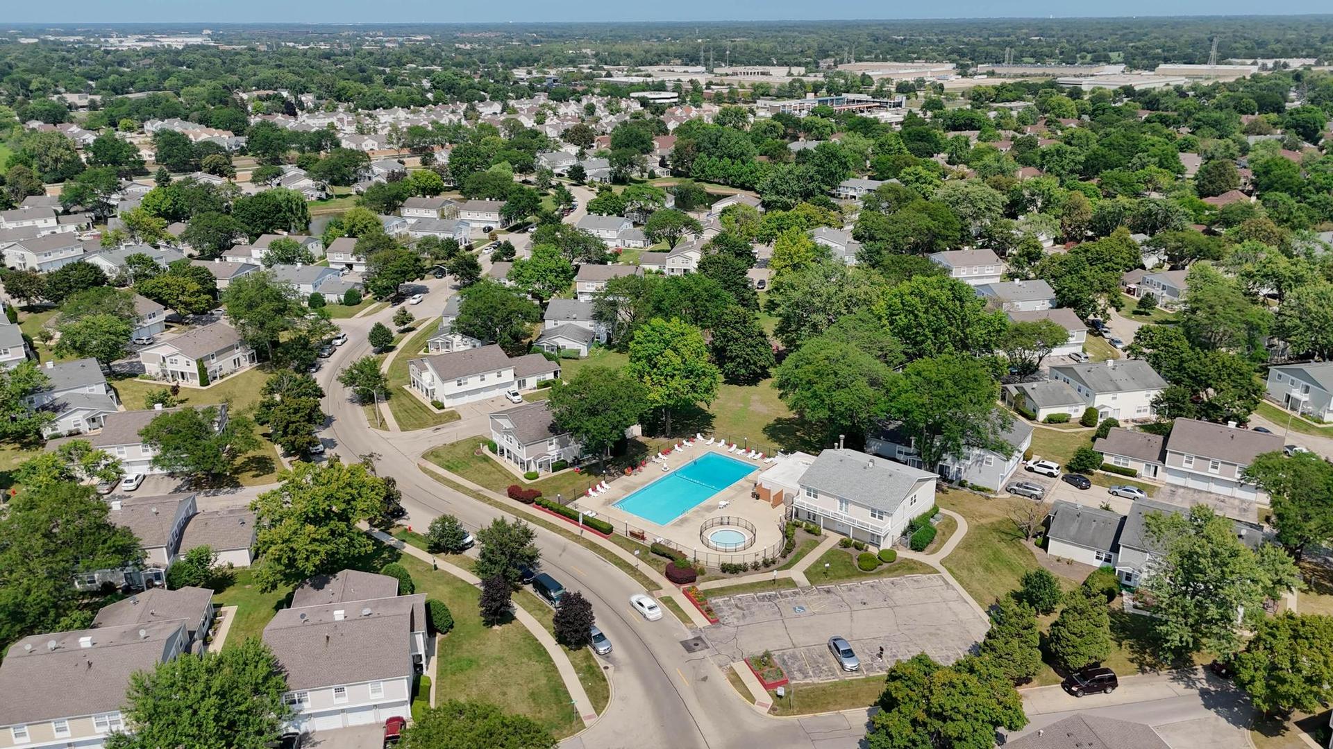 1312 Fall Court, Unit 1312 Wheeling, IL 60090 - Photo 24 of 28 an aerial view of a house with a yard