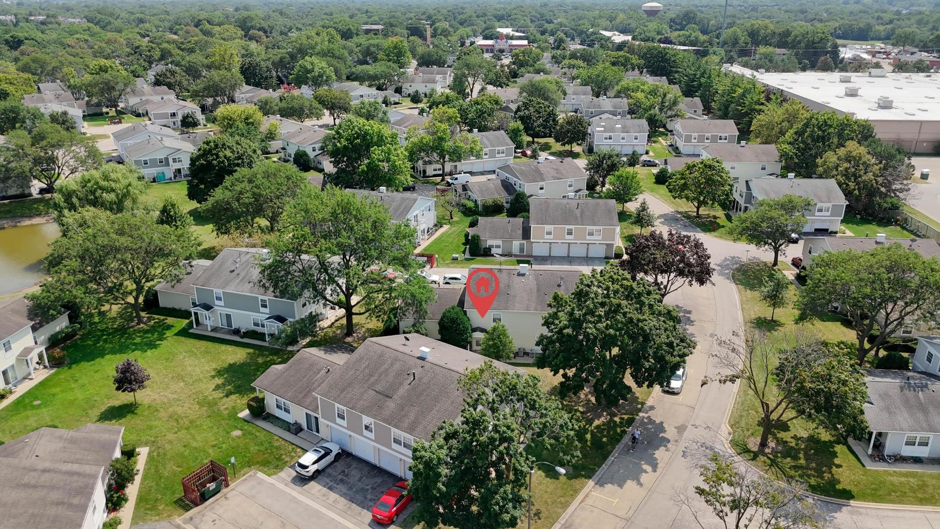 1312 Fall Court, Unit 1312 Wheeling, IL 60090 - Photo 25 of 28 an aerial view of houses with yard