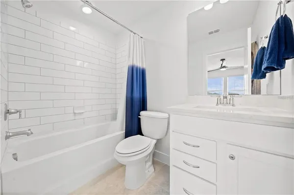 a view of storage and utility room with washer and dryer
